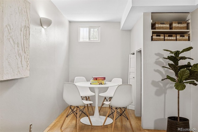 dining room with wood finished floors