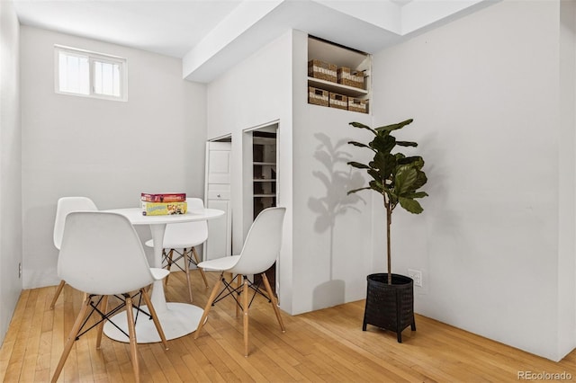 dining area featuring hardwood / wood-style floors