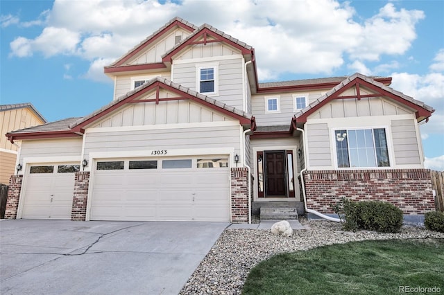 craftsman inspired home with a garage