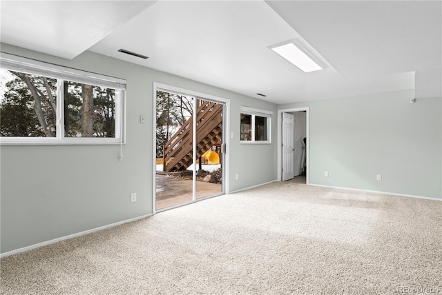 spare room featuring carpet flooring