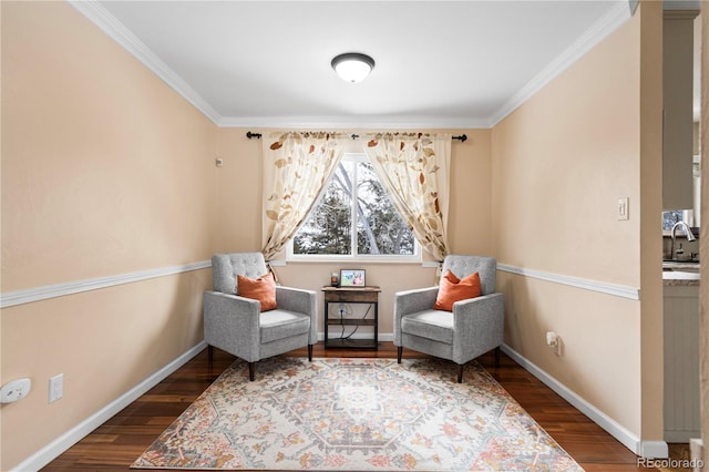 45 E Mikado Dr, Colorado Springs, CO 80919 - sitting room featuring crown molding, baseboards, and wood finished floors