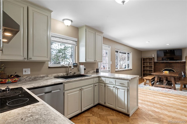 45 E Mikado Dr, Colorado Springs, CO 80919 - kitchen featuring a sink, dishwasher, range hood, and a peninsula