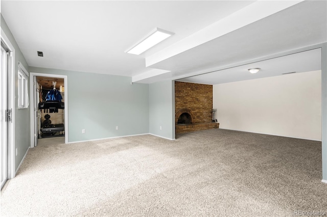 45 E Mikado Dr, Colorado Springs, CO 80919 - unfurnished living room with carpet, a fireplace, and baseboards