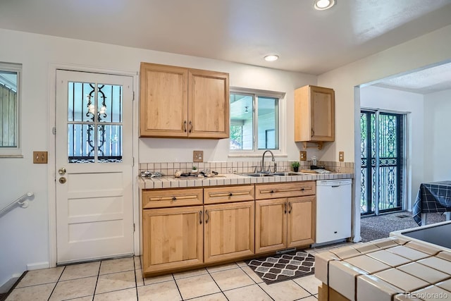 9270 Tennyson St, Westminster, CO 80031 - kitchen with tile countertops, a sink, white dishwasher, light brown cabinetry, and recessed lighting