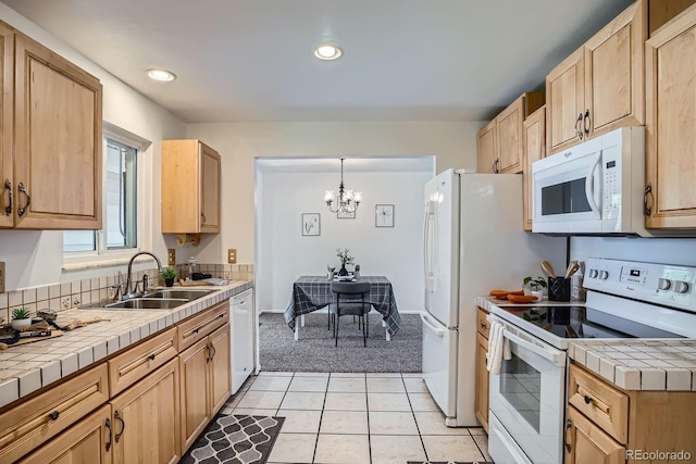 9270 Tennyson St, Westminster, CO 80031 - kitchen featuring white appliances, a sink, tile countertops, light colored carpet, and recessed lighting