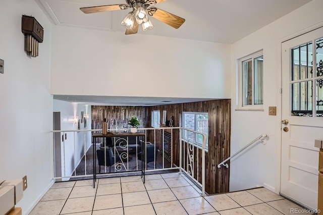 9270 Tennyson St, Westminster, CO 80031 - foyer entrance with light tile patterned floors, healthy amount of natural light, baseboards, and a ceiling fan