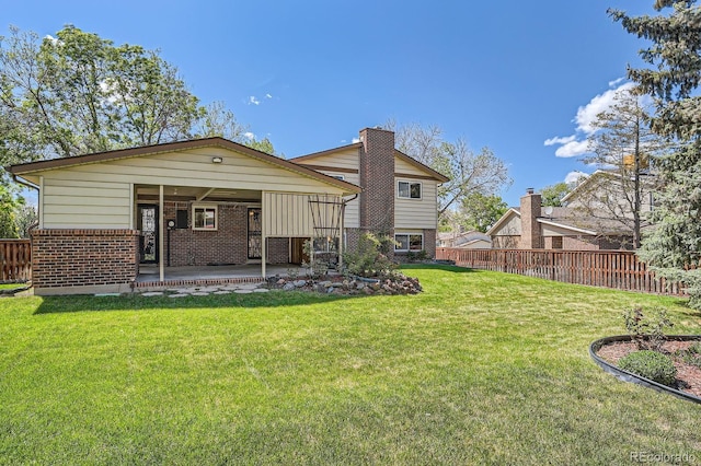 9270 Tennyson St, Westminster, CO 80031 - back of house featuring brick siding