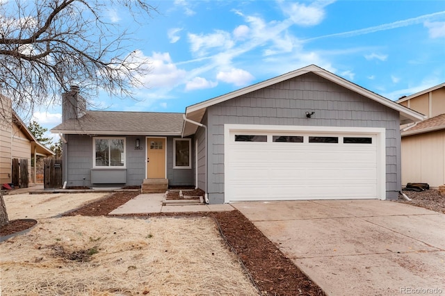 ranch-style home featuring a shingled roof, driveway, a chimney, and an attached garage