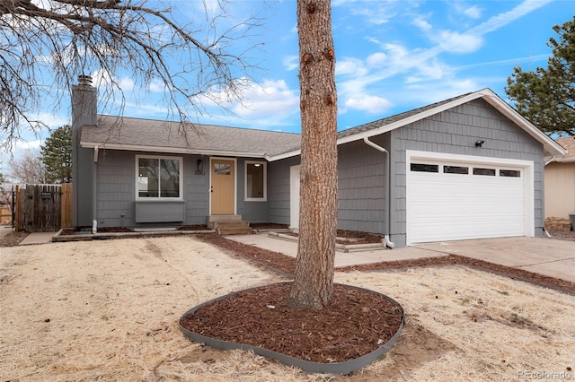 ranch-style house featuring a garage, driveway, a chimney, roof with shingles, and fence