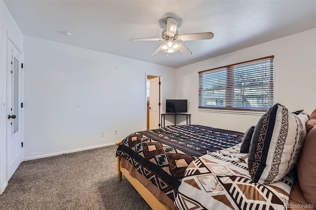 bedroom featuring carpet flooring, a ceiling fan, and baseboards