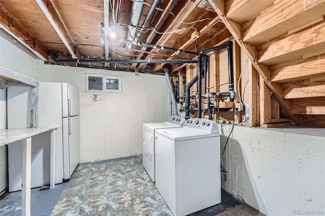 washroom with laundry area and washing machine and clothes dryer