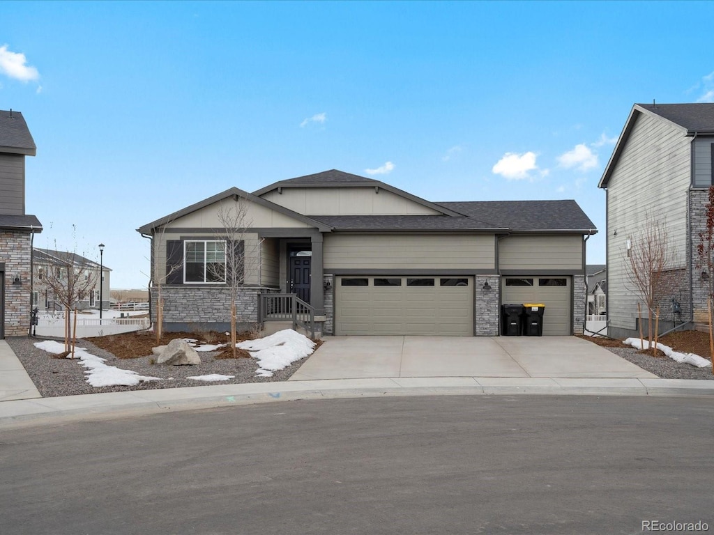 view of front of property with a garage and concrete driveway