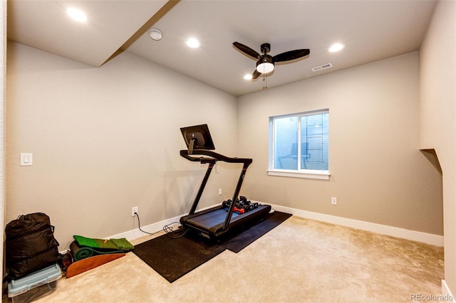 exercise area featuring carpet floors and ceiling fan