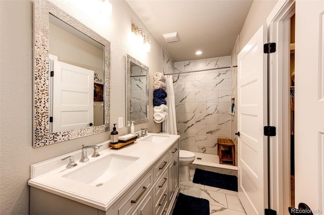 bathroom featuring a shower with curtain, vanity, and toilet