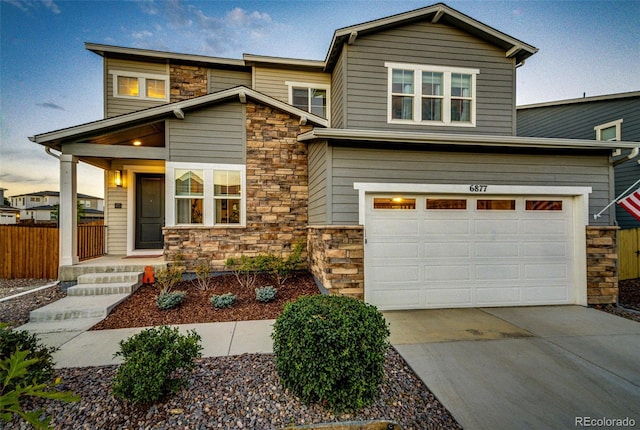 craftsman-style home with a garage