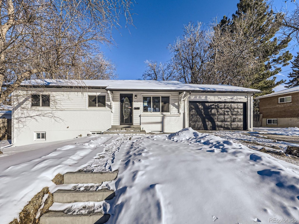 view of front of property featuring a garage