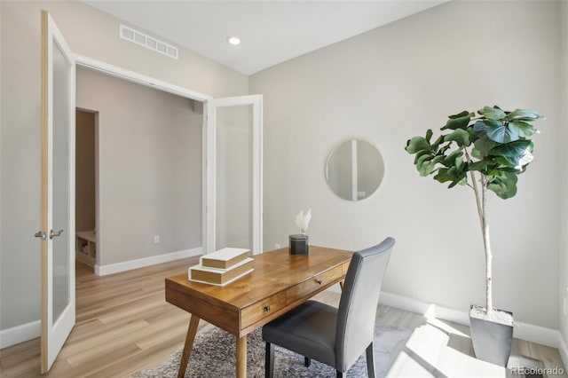 home office featuring light wood-type flooring