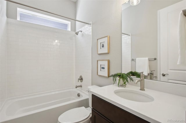 full bathroom featuring vanity, shower / tub combination, and toilet