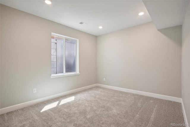 view of carpeted spare room