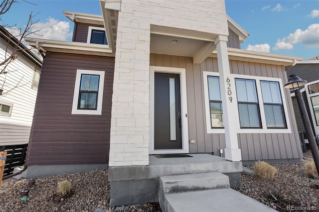 property entrance with board and batten siding