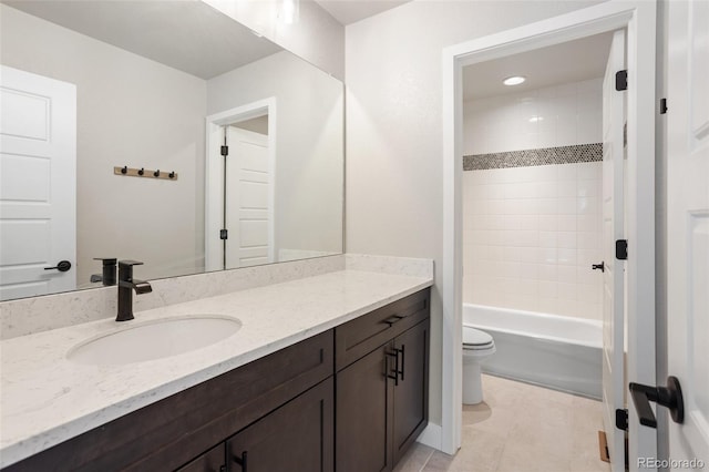 bathroom featuring bathtub / shower combination, vanity, and toilet