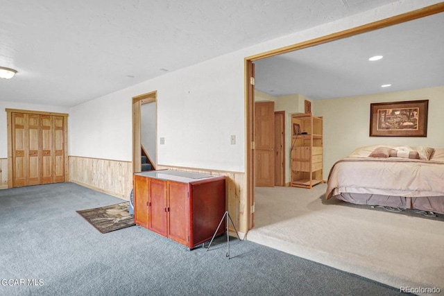 153 Gcr 135, Kremmling, CO 80459 - bedroom with recessed lighting, wooden walls, wainscoting, and carpet floors