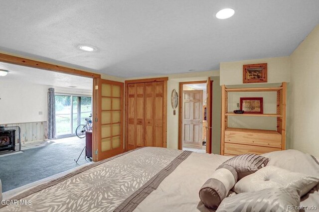 153 Gcr 135, Kremmling, CO 80459 - bedroom featuring carpet flooring, a closet, recessed lighting, and access to exterior