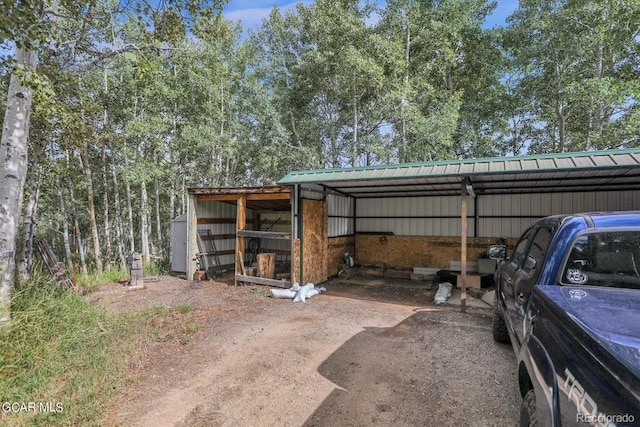 153 Gcr 135, Kremmling, CO 80459 - garage featuring a detached carport