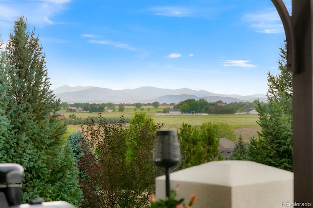 view of mountain feature featuring a rural view