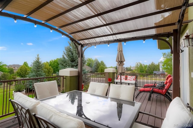 wooden terrace featuring outdoor lounge area and a pergola