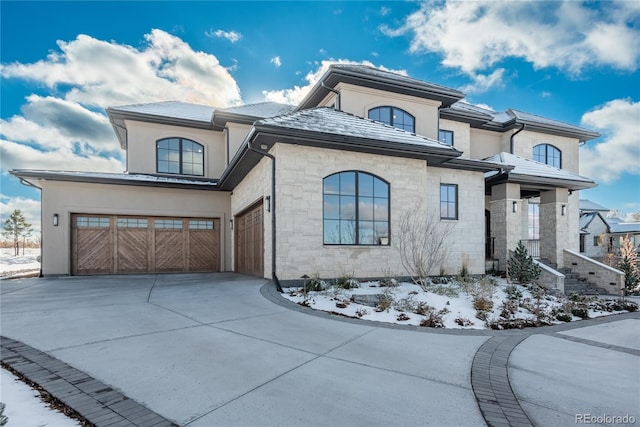 view of front of property featuring a garage