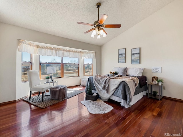 bedroom with wood-type flooring, baseboards, vaulted ceiling, and a textured ceiling