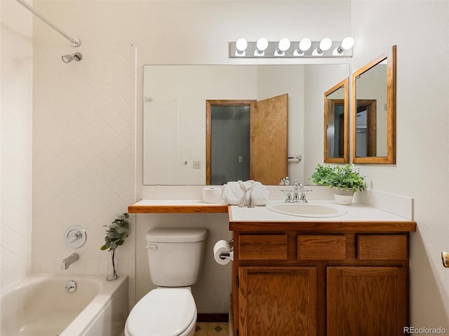 bathroom featuring shower / bath combination, vanity, and toilet