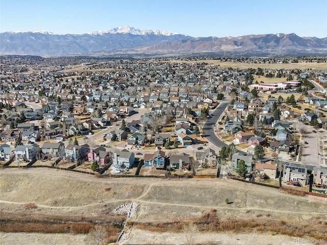 aerial view featuring a residential view and a mountain view