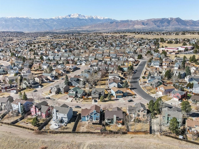 drone / aerial view featuring a mountain view and a residential view