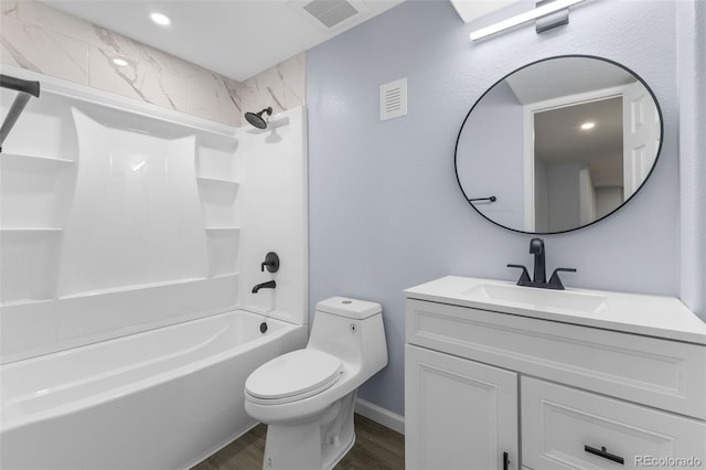 full bathroom with visible vents, toilet, vanity, shower / tub combination, and wood finished floors