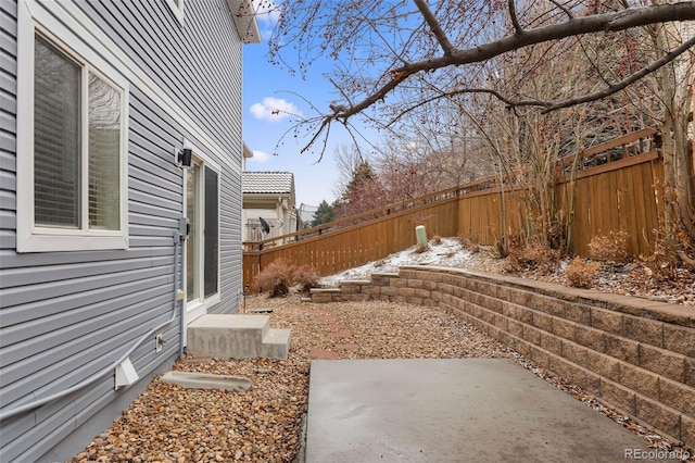 view of yard featuring a fenced backyard and a patio