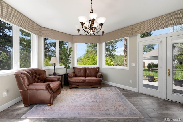 10914 Remmick Ridge Rd, Parker, CO 80134 - sunroom featuring french doors, healthy amount of natural light, and baseboards