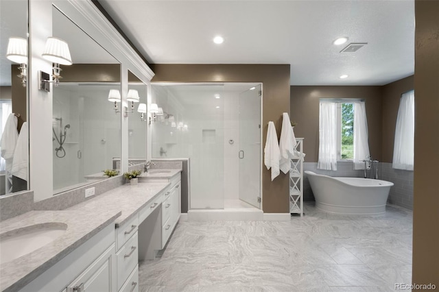 10914 Remmick Ridge Rd, Parker, CO 80134 - bathroom with a stall shower, double vanity, a freestanding tub, tile walls, and a chandelier