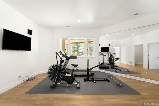 10914 Remmick Ridge Rd, Parker, CO 80134 - workout room with baseboards, wood finished floors, and recessed lighting