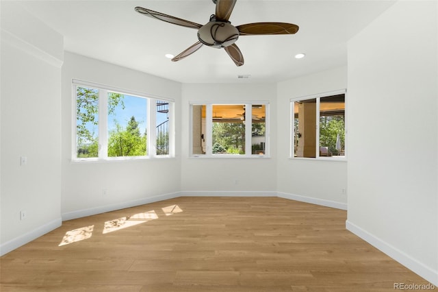 10914 Remmick Ridge Rd, Parker, CO 80134 - unfurnished room featuring baseboards, recessed lighting, a ceiling fan, and light wood-type flooring