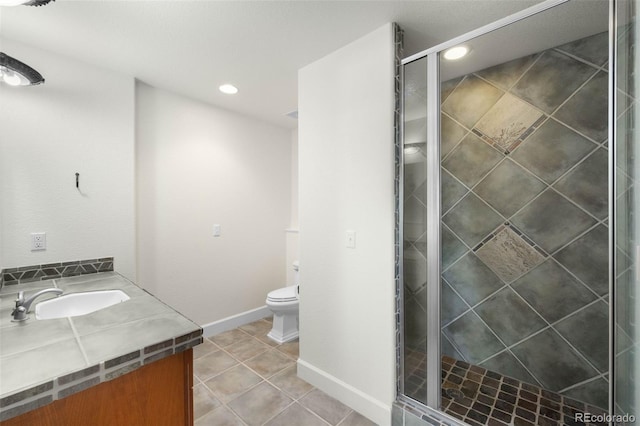 10914 Remmick Ridge Rd, Parker, CO 80134 - bathroom featuring vanity, a stall shower, toilet, recessed lighting, and tile patterned floors