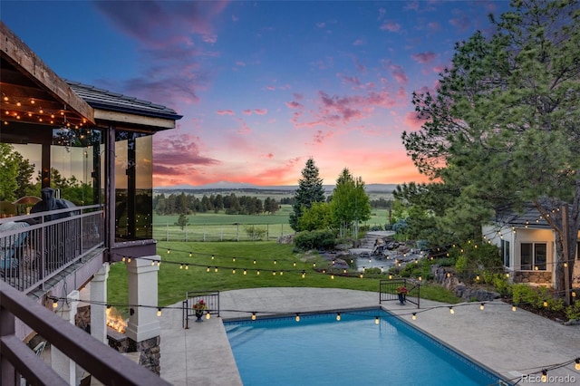 10914 Remmick Ridge Rd, Parker, CO 80134 - outdoor pool with a patio and a view of rural / pastoral area