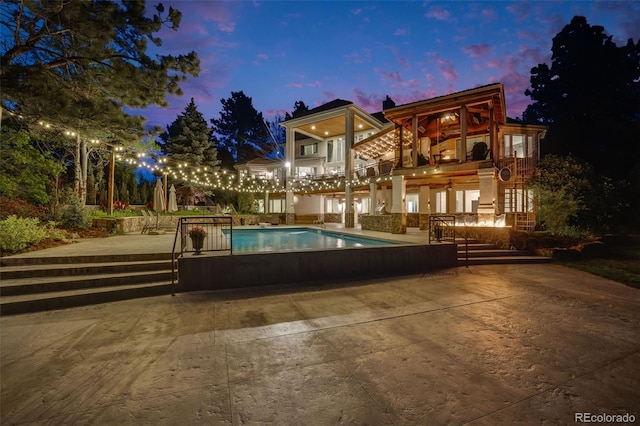 10914 Remmick Ridge Rd, Parker, CO 80134 - swimming pool with a patio