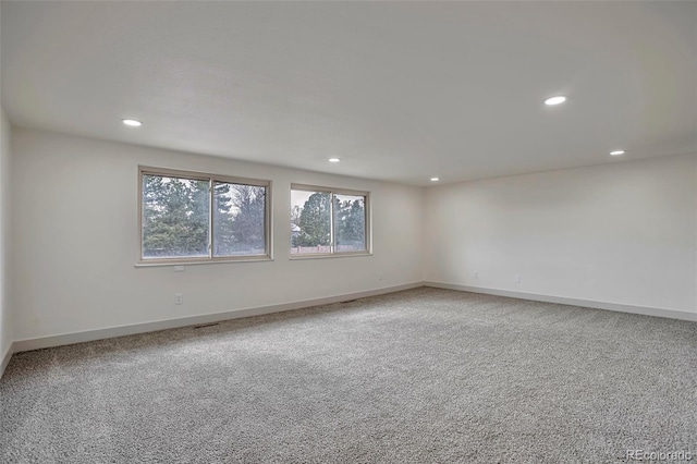 12164 E Amherst Cir, Aurora, CO 80014 - carpeted empty room with baseboards and recessed lighting