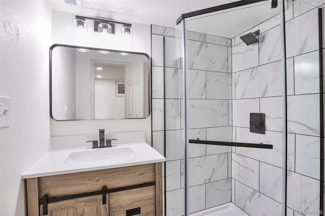 12164 E Amherst Cir, Aurora, CO 80014 - bathroom featuring a shower stall and vanity