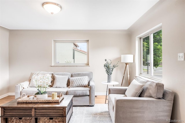 2255 Perry St, Denver, CO 80212 - living area featuring light wood-style floors and baseboards