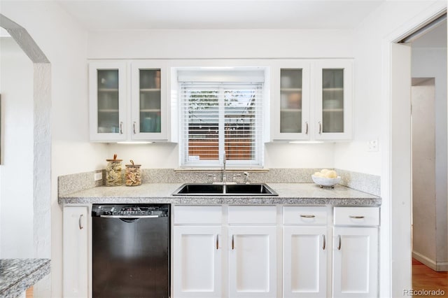 2255 Perry St, Denver, CO 80212 - kitchen with black dishwasher, a sink, white cabinets, and glass insert cabinets