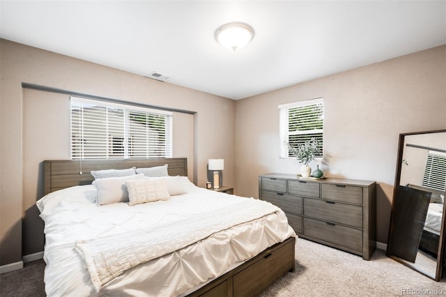 2255 Perry St, Denver, CO 80212 - bedroom featuring light carpet and baseboards