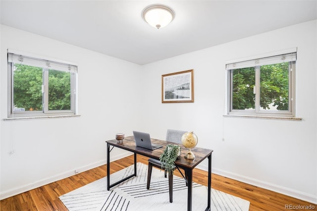 2255 Perry St, Denver, CO 80212 - home office with baseboards and wood finished floors